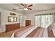 Spacious main bedroom with an exterior door that provides direct access to the patio at 2350 Paulette Dr, Haines City, FL 33844