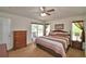Spacious main bedroom with an exterior door that provides direct access to the patio at 2350 Paulette Dr, Haines City, FL 33844