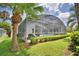 Lovely backyard view of screen enclosed lanai and pool at 2350 Paulette Dr, Haines City, FL 33844