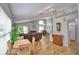 Open-concept living room featuring vaulted ceilings, tile floors, and ample natural light at 2350 Paulette Dr, Haines City, FL 33844