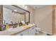Bathroom showcasing double sinks and granite countertops at 2602 Whitewood Rd, Mulberry, FL 33860