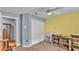 Another bedroom view showcasing closet space and yellow accent wall at 2602 Whitewood Rd, Mulberry, FL 33860