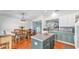 Bright and airy living space with kitchen and dining area is perfect for gatherings at 2602 Whitewood Rd, Mulberry, FL 33860