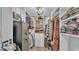 A spacious walk-in closet with custom shelving, drawers, and ample storage for clothing and accessories at 2602 Whitewood Rd, Mulberry, FL 33860