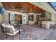 Outdoor patio with a wood ceiling, built-in bar, and seamless flow to indoor living space at 2977 Sequoyah Dr, Haines City, FL 33844
