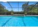 A gorgeous pool with a water feature at 2977 Sequoyah Dr, Haines City, FL 33844