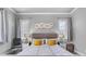 Inviting bedroom showcasing a tufted headboard, stylish bedding, and coordinating nightstands with lamps at 2988 Sequoyah Dr, Haines City, FL 33844