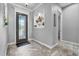 Inviting entryway with decorative door, stylish flooring, and elegant wall accents, creating a warm welcome at 2988 Sequoyah Dr, Haines City, FL 33844