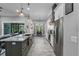 Gourmet kitchen featuring a large island, stainless steel appliances, and an open layout at 2988 Sequoyah Dr, Haines City, FL 33844