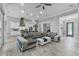 Cozy living area with plush seating, recessed lighting, and seamless transition to the adjacent spaces at 2988 Sequoyah Dr, Haines City, FL 33844