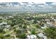 A high angle view of a residential neighborhood near a lake at 304 W Lake Ave, Auburndale, FL 33823