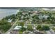 Aerial view of a neighborhood with mature trees and lake views at 304 W Lake Ave, Auburndale, FL 33823
