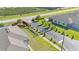 Aerial view of a gated community entrance with landscaping and guard house at 3173 Whispering Trails Ave, Winter Haven, FL 33884