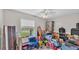 Bedroom view showing toys, luggage, and exercise equipment at 326 Sunset Rd, Frostproof, FL 33843