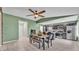 Eat-in kitchen with dark cabinets, stainless appliances and tile flooring at 326 Sunset Rd, Frostproof, FL 33843