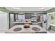 Kitchen view with breakfast bar, dark cabinets and stainless steel appliances at 326 Sunset Rd, Frostproof, FL 33843