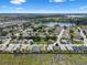 Highlighted aerial view of a home in a community with a lake, showcasing its location and neighborhood at 348 Lake Suzanne Dr, Lake Wales, FL 33859