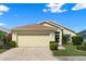Charming one-story home with a well-manicured lawn and inviting curb appeal at 348 Lake Suzanne Dr, Lake Wales, FL 33859