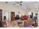Comfortable and inviting living room with vaulted ceilings and ample seating at 348 Lake Suzanne Dr, Lake Wales, FL 33859