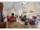 Open-concept living space with ample natural light and stylish furnishings at 348 Lake Suzanne Dr, Lake Wales, FL 33859