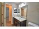 Bathroom featuring a single sink and a toilet at 373 St Georges Cir, Eagle Lake, FL 33839