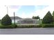 Welcome to Normandy Heights! Beautifully landscaped entrance sign provides a sense of community pride at 373 St Georges Cir, Eagle Lake, FL 33839