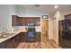 Modern kitchen with sleek appliances, laminate countertops, and ample storage space at 373 St Georges Cir, Eagle Lake, FL 33839