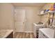 Laundry room featuring wood style floors and newer washer and dryer at 373 St Georges Cir, Eagle Lake, FL 33839