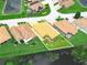 Aerial view of the property showcases its prime location, manicured landscaping, and stunning waterfront views at 3802 Litchfield Loop, Lake Wales, FL 33859