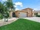 Charming single-story home with well-manicured lawn, mature trees, neutral paint, and two-car garage at 3802 Litchfield Loop, Lake Wales, FL 33859