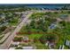 An aerial view with the lot outlined in red, illustrating its position relative to the road and surrounding buildings at 407 Snively Ave, Winter Haven, FL 33880