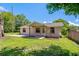 Exterior view of home showcasing the front porch and well-maintained lawn at 407 Snively Ave, Winter Haven, FL 33880