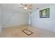 Light-filled living room features elegant tile floors, creating a welcoming and stylish atmosphere at 407 Snively Ave, Winter Haven, FL 33880