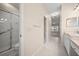Bright bathroom featuring a shower and vanity area, offering a functional layout at 4254 Berwick Dr, Lake Wales, FL 33859