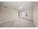 Bright bedroom with a large window offering natural light and a ceiling fan at 4254 Berwick Dr, Lake Wales, FL 33859