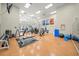 Bright gym with various workout machines, weights, and exercise equipment at 4254 Berwick Dr, Lake Wales, FL 33859