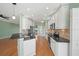 Well-equipped kitchen with stainless steel appliances, granite countertops, and white cabinets at 4254 Berwick Dr, Lake Wales, FL 33859