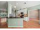Modern kitchen with granite countertops, stainless steel appliances, and white cabinetry at 4254 Berwick Dr, Lake Wales, FL 33859
