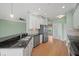 Kitchen featuring stainless steel appliances, granite countertops, and a breakfast bar at 4254 Berwick Dr, Lake Wales, FL 33859
