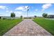 Scenic memorial featuring personalized bricks and monuments leading to a flagpole at 4254 Berwick Dr, Lake Wales, FL 33859