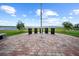 Scenic memorial featuring personalized bricks and monuments with water views at 4254 Berwick Dr, Lake Wales, FL 33859