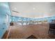 Indoor community pool, with lane markers and ample deck space, and large windows with views at 4254 Berwick Dr, Lake Wales, FL 33859