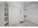 Spacious walk-in closet with ample shelving and storage space, providing organization at 4254 Berwick Dr, Lake Wales, FL 33859