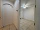 The bedroom has tile flooring and a ceiling fan at 4469 Turnberry Ln, Lake Wales, FL 33859