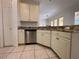 Kitchen with stainless steel dishwasher and countertops, offering style and functionality at 4469 Turnberry Ln, Lake Wales, FL 33859