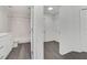 Bright bathroom connects to closet; shows tub/shower combo and modern finishes at 529 Terranova Cir, Winter Haven, FL 33884