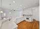 Kitchen featuring white cabinets, stainless steel appliances, and granite countertops at 5340 Nicklaus Dr, Winter Haven, FL 33884