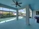 A covered patio with a pool and a hot tub at 5340 Nicklaus Dr, Winter Haven, FL 33884