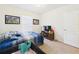 Bright bedroom with a large window and well-placed furniture at 5751 Lakeside Landings Blvd, Winter Haven, FL 33881