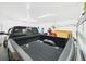 Garage featuring a full-size dark blue truck at 5751 Lakeside Landings Blvd, Winter Haven, FL 33881